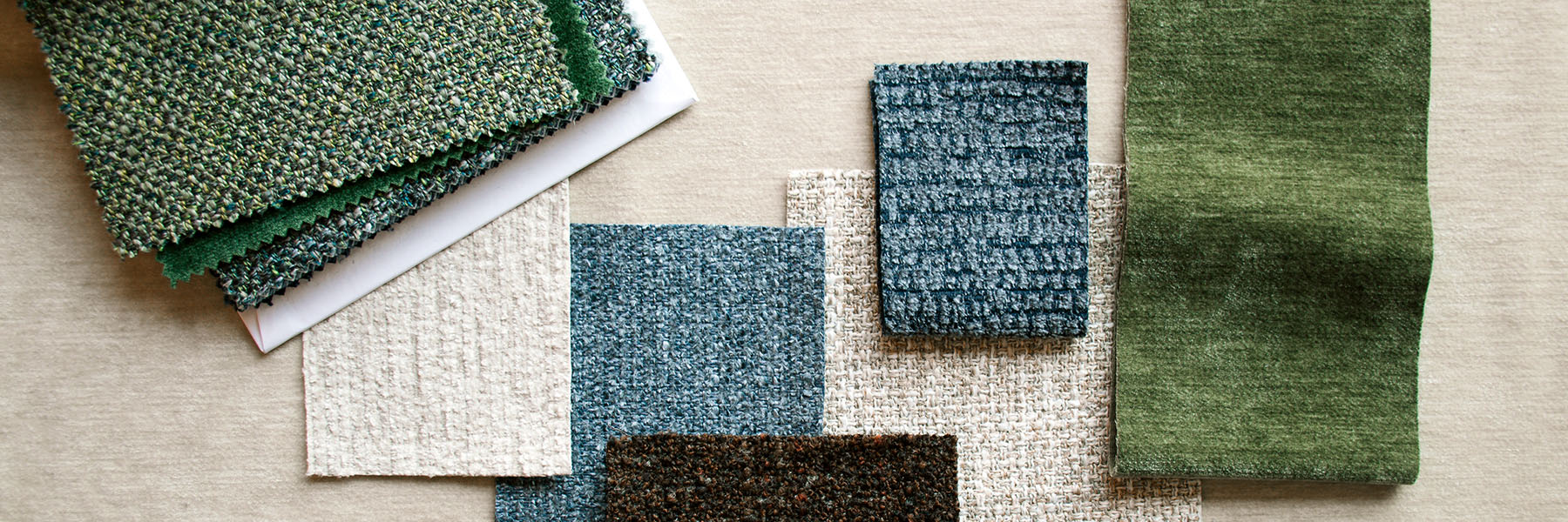 Flat lay of textured fabrics from Greenhouse fabric's sample book F58.