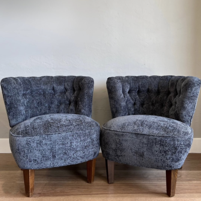 Two chairs upholstered in F4799 Navy