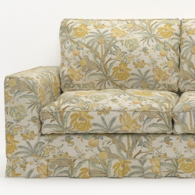 Sofa upholstered with a beige and yellow floral fabric.